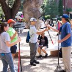 uf volunteers cleaning up after hurricane irma featuring people with rakes