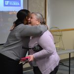 photo of ufhr's kenya williams hugging heo recipient