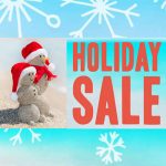 holiday sale image with snowflakes and sandmen with santa hats