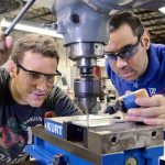 uf employee and student working together