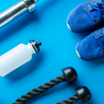 Men's Health: Exercise equipment on blue background