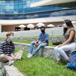 Students sitting outside the union