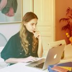 Woman working on a laptop