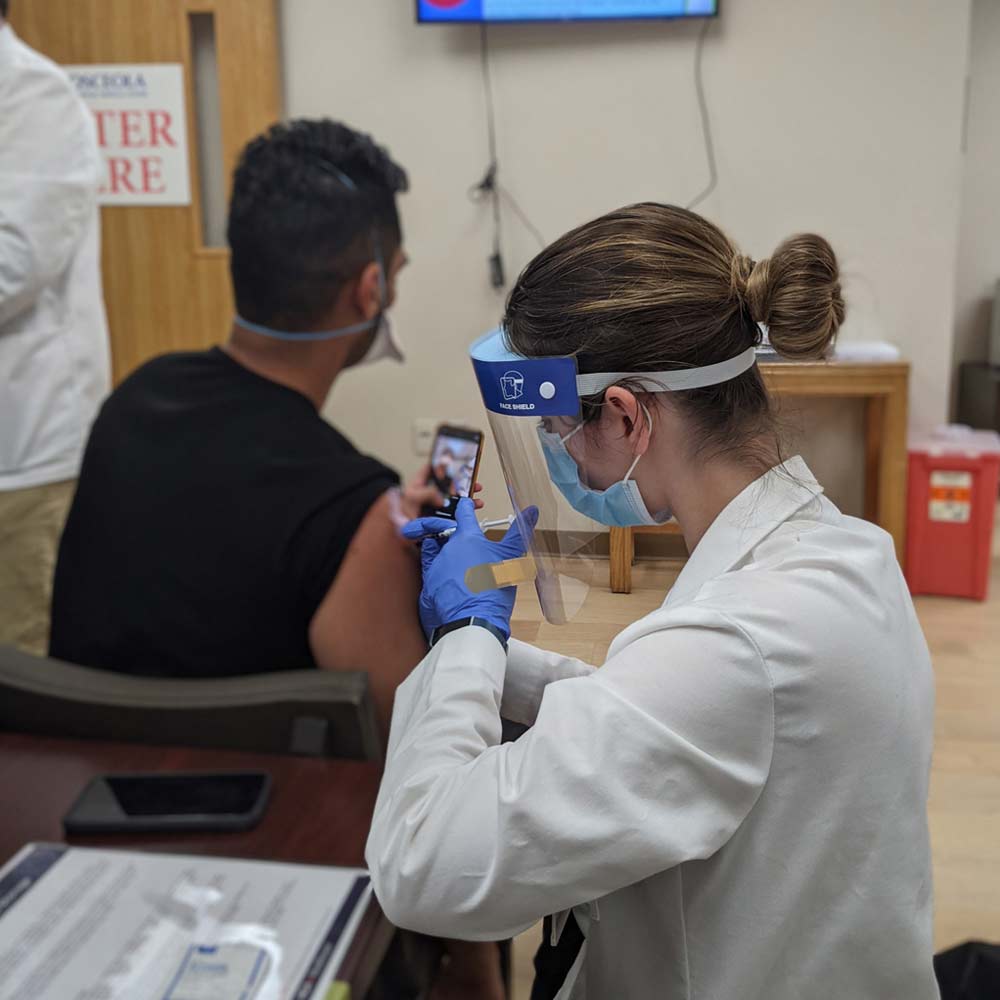 UF Pharmacy students helping to administer COVID19 vaccines UF At Work