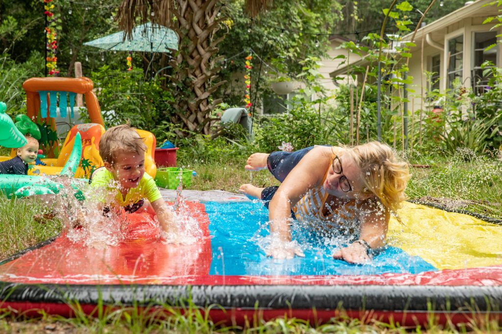 family playing in yard